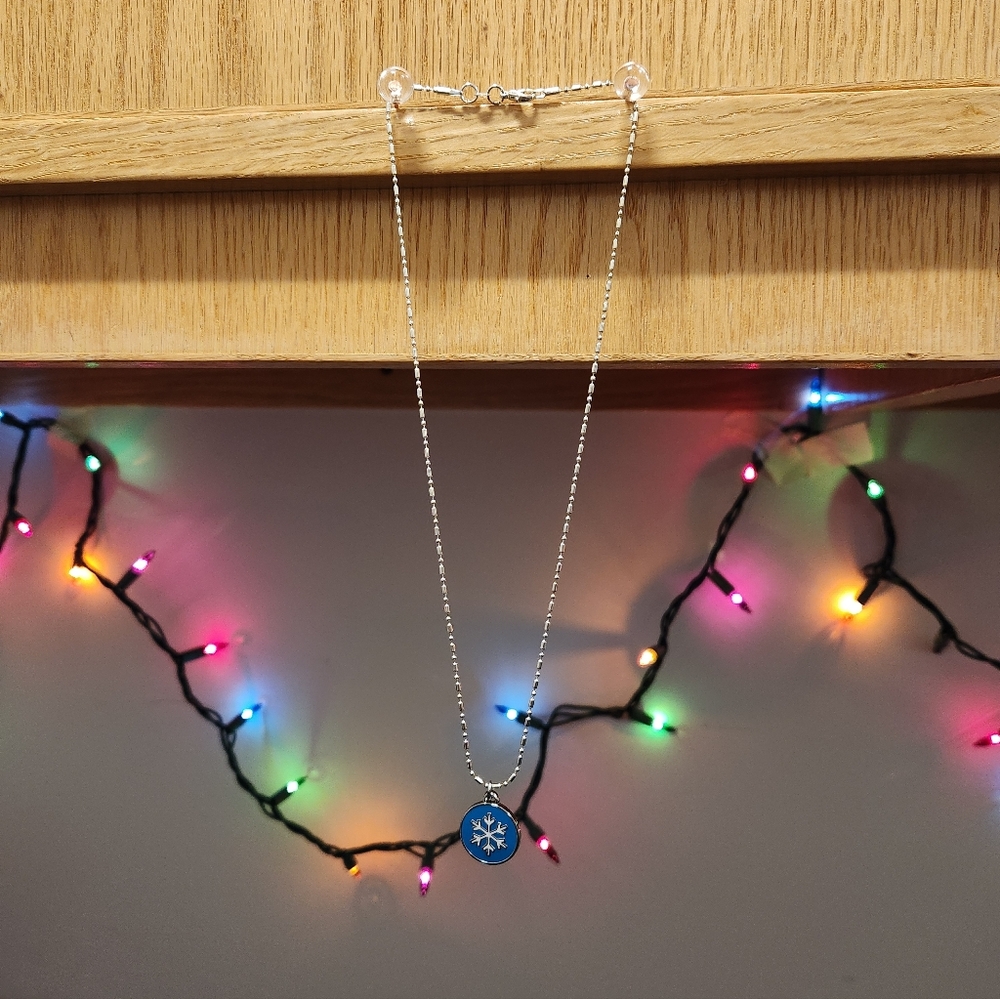 Coach Silver Necklace with Blue Snowflake Pendant